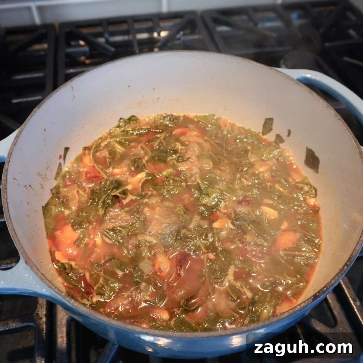 Savory Sausage and Slow-Simmered Collard Greens Recipe 9 cooked down collard greens and sausage.