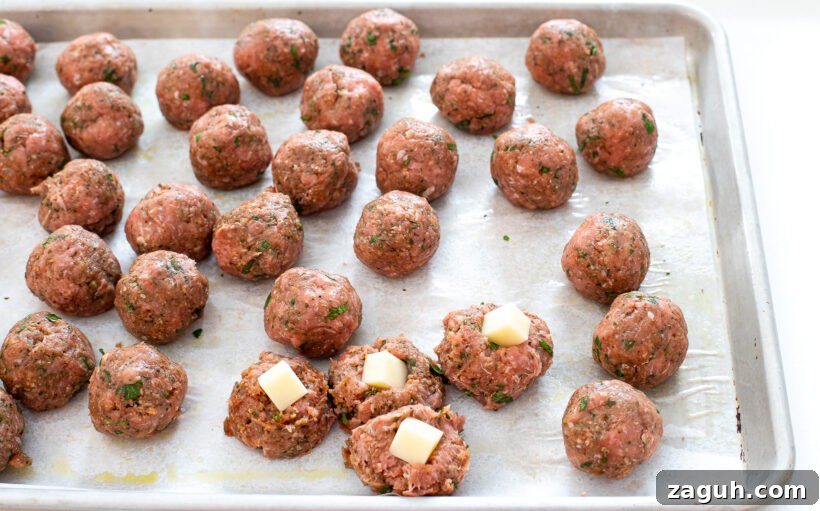 stuffing meatballs with mozzarella cheese
