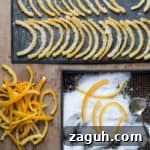Coating the candied orange peel in granulated sugar