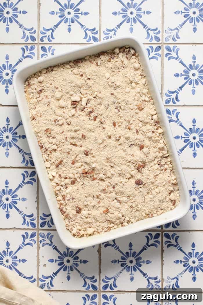 Make-Ahead Banana Coffee Cake Recipe for Perfect Morning Baking 7 Make-ahead banana coffee cake assembled and ready to bake in a white baking pan