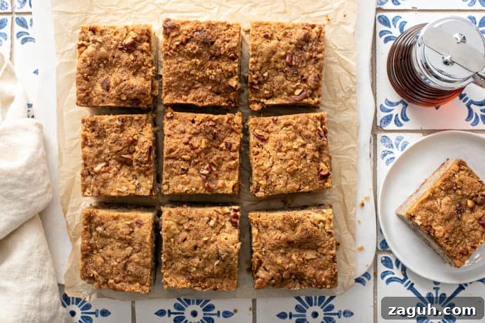 Make-Ahead Banana Coffee Cake Recipe for Perfect Morning Baking 8 Banana coffee cake cut into pieces on a piece of parchment paper