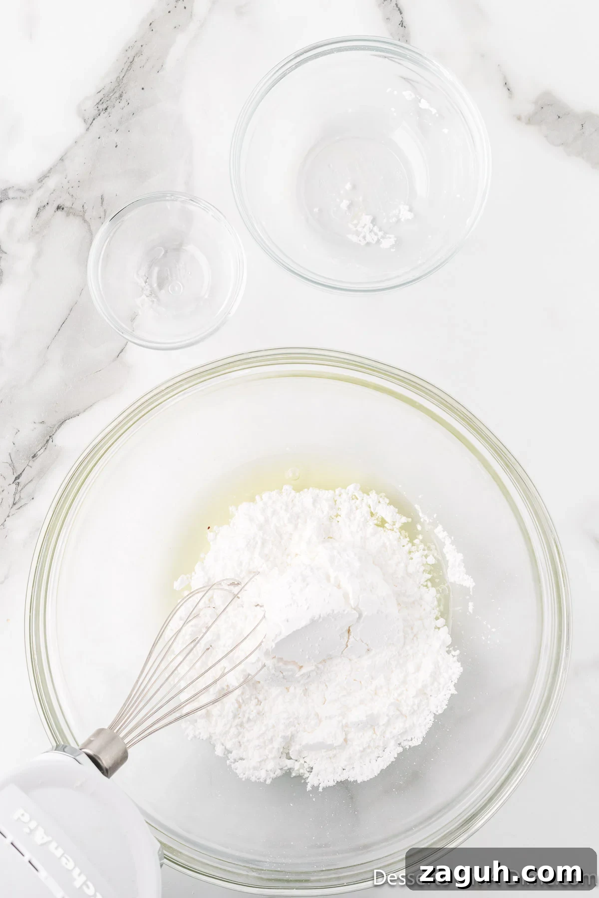 Powdered sugar added to bowl and combined. 