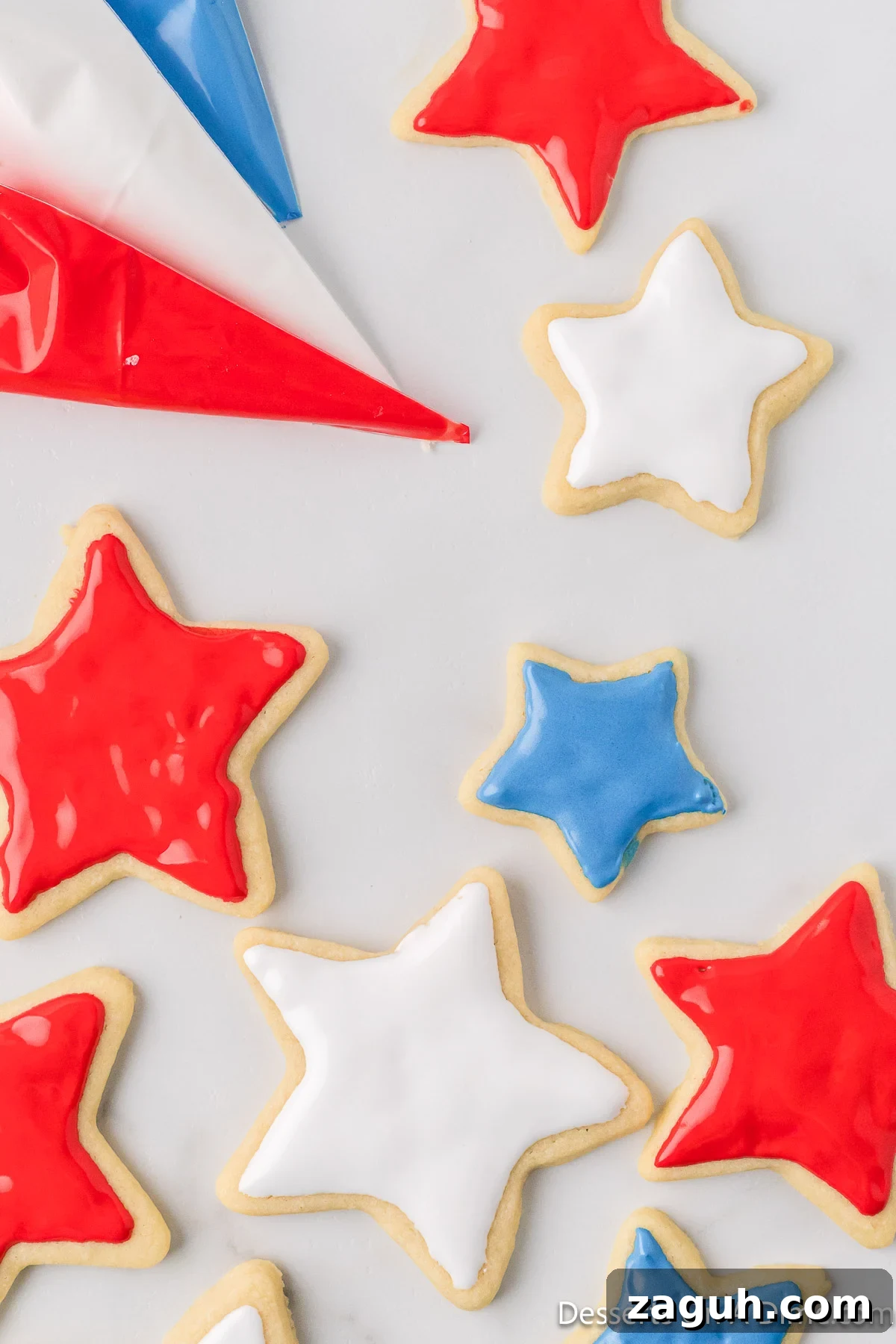 Icing piped on cookies. 
