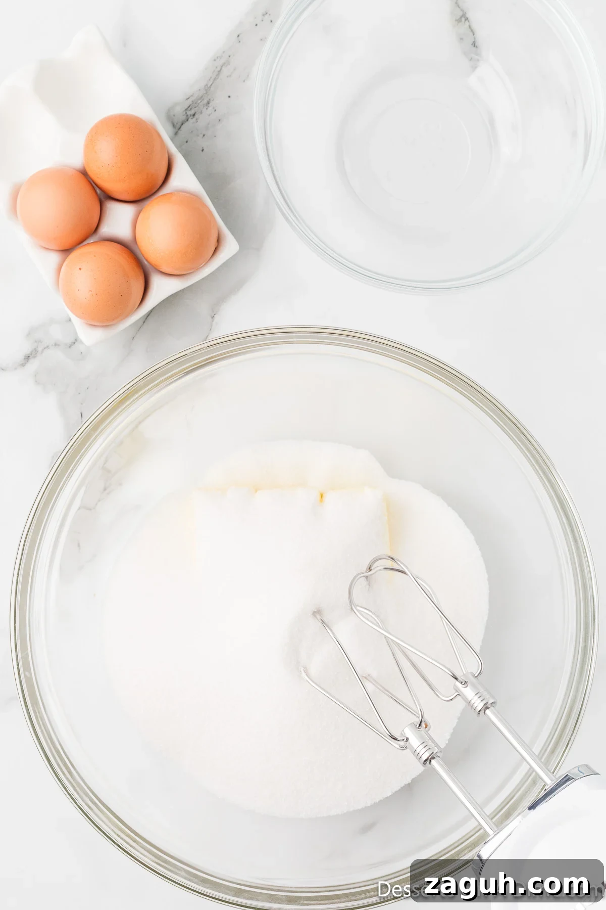 Mixing bowl with softened butter and sugar. 