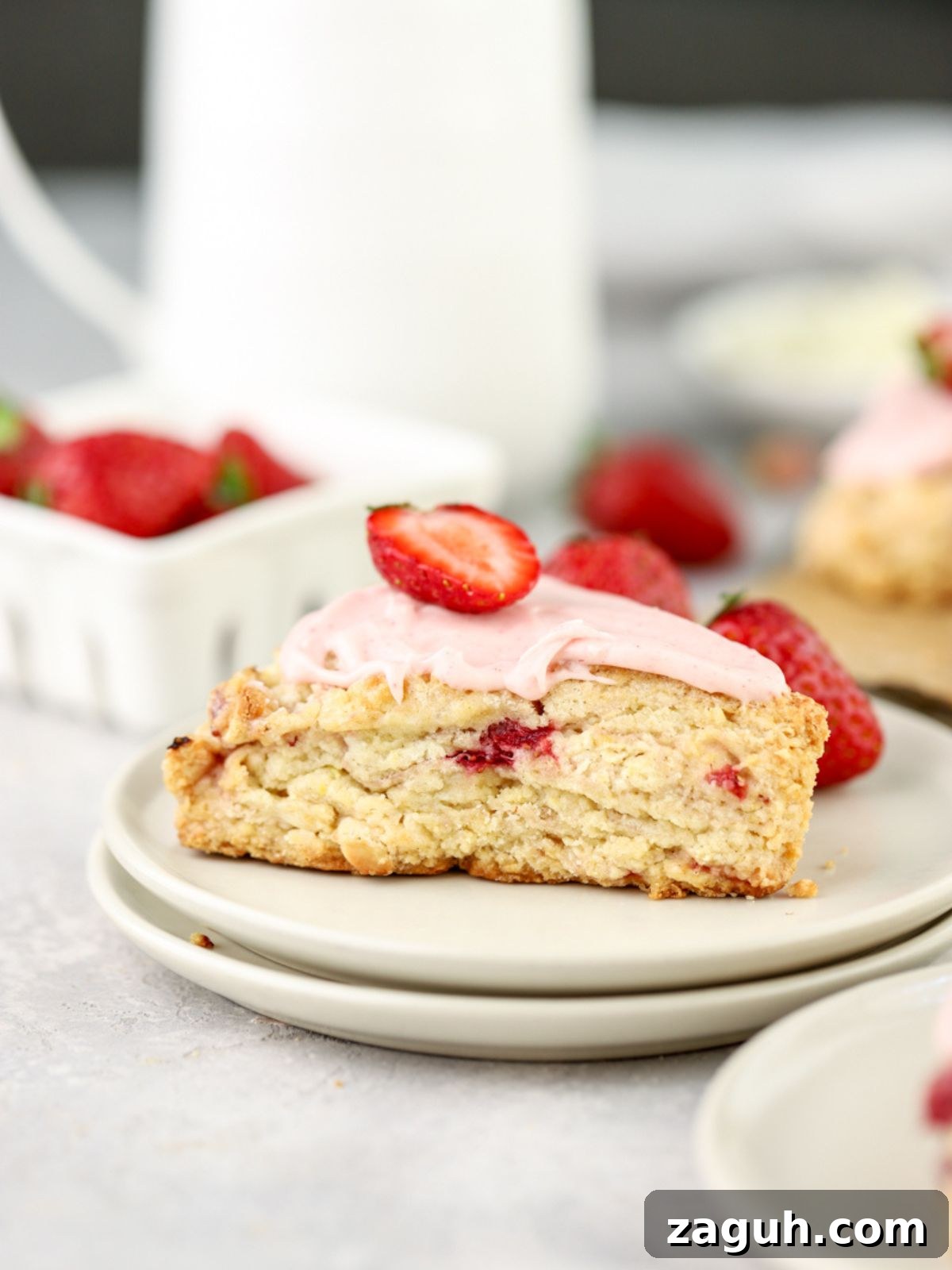 Flaky Strawberry Scones with Glaze — Homemade Recipe 8 Close-up of a iced strawberry scone