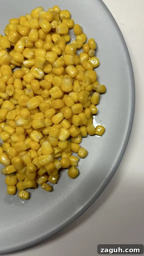 Copycat Texas Roadhouse Buttered Corn Recipe (Quick & Creamy) 2 Texas Roadhouse Buttered Corn Recipe