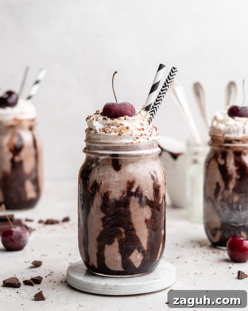 Black Forest Chocolate Cherry Milkshake Recipe 4 This creamy black forest milkshake features rich chocolate ice cream, sweet flavorful cherry jam, and a nice helping of whipped cream on top!