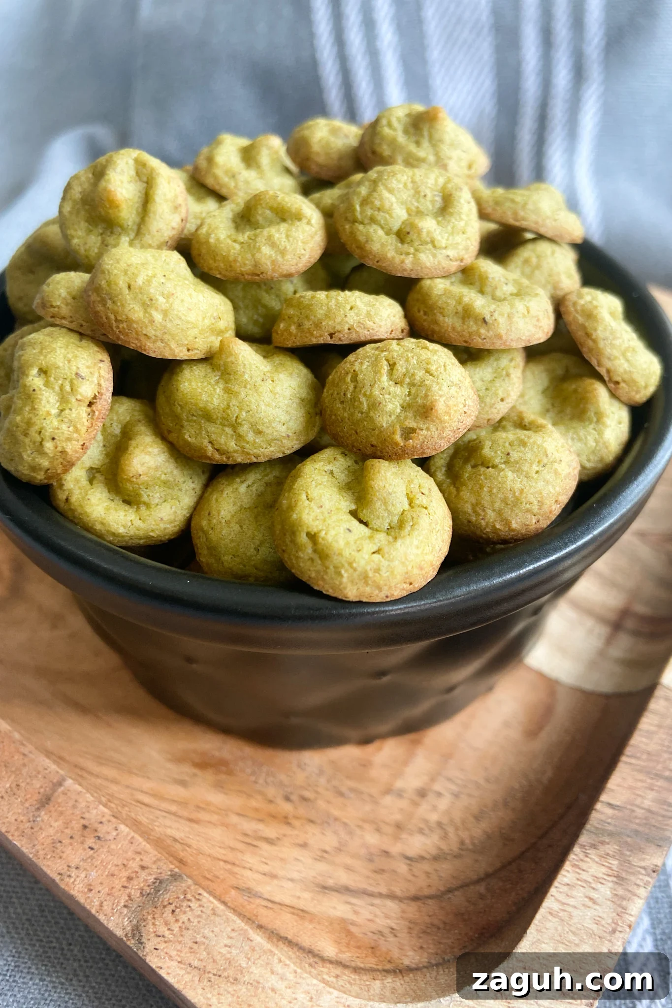 Spinach and Apple Baby Puffs: Nutritious Homemade Finger Food 6 Spinach banana puffs served in a black container