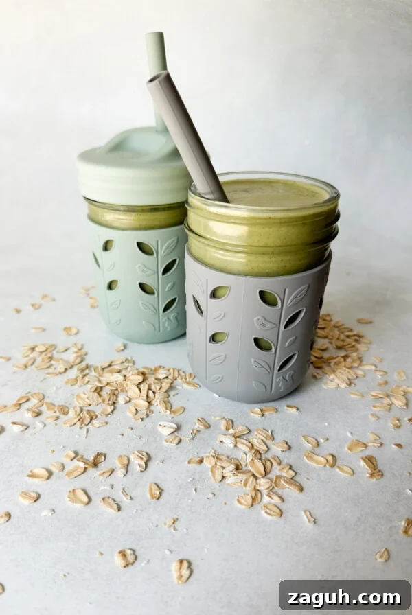 Spinach and Apple Baby Puffs: Nutritious Homemade Finger Food 10 Spinach banana smoothies in toddler glass tumblers with silicone sleeves.