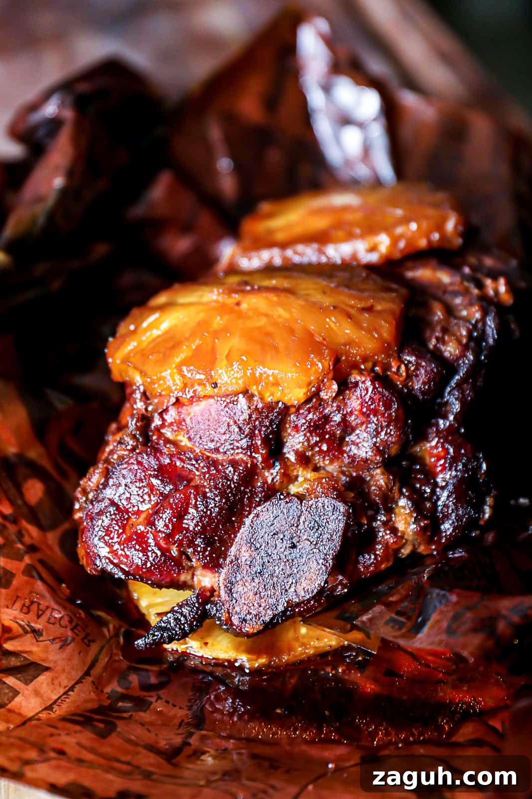 Maximize Smoke Flavor From Your Smoker: Tips That Really Work 14 Butcher paper wrapped smoky flavored pork shoulder with pineapple