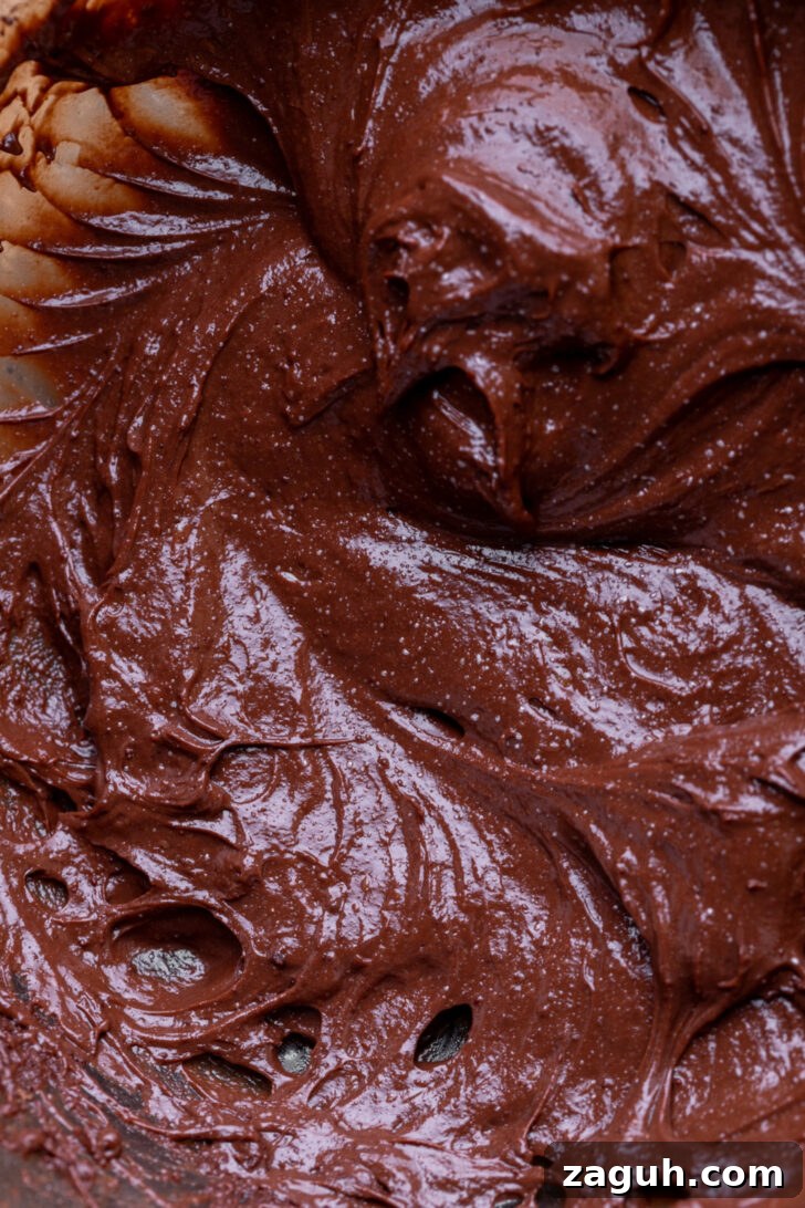 Decadent Chocolate Mousse Cake Recipe for Chocolate Lovers 6 Chocolate pudding in a bowl.