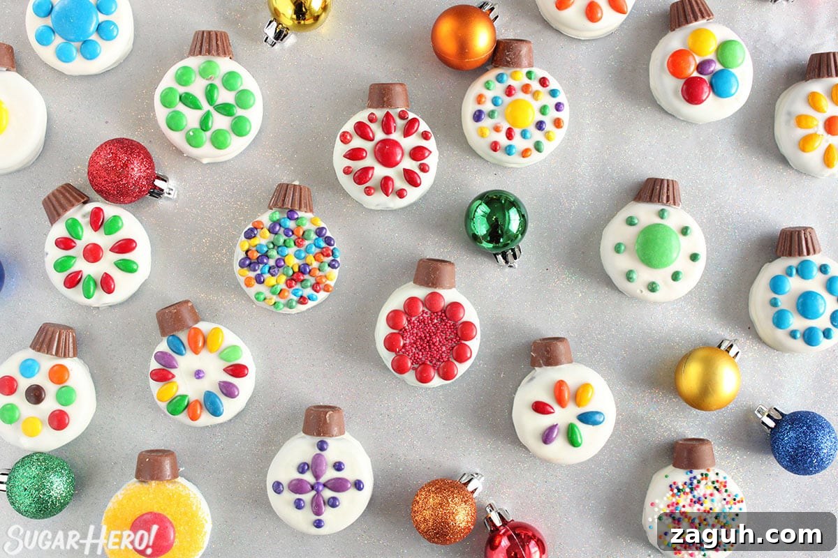 DIY Oreo Cookie Christmas Ornaments: Festive Homemade Ideas 9 Overhead shot of colorful Oreo Cookie Christmas Ornaments on a silver background.