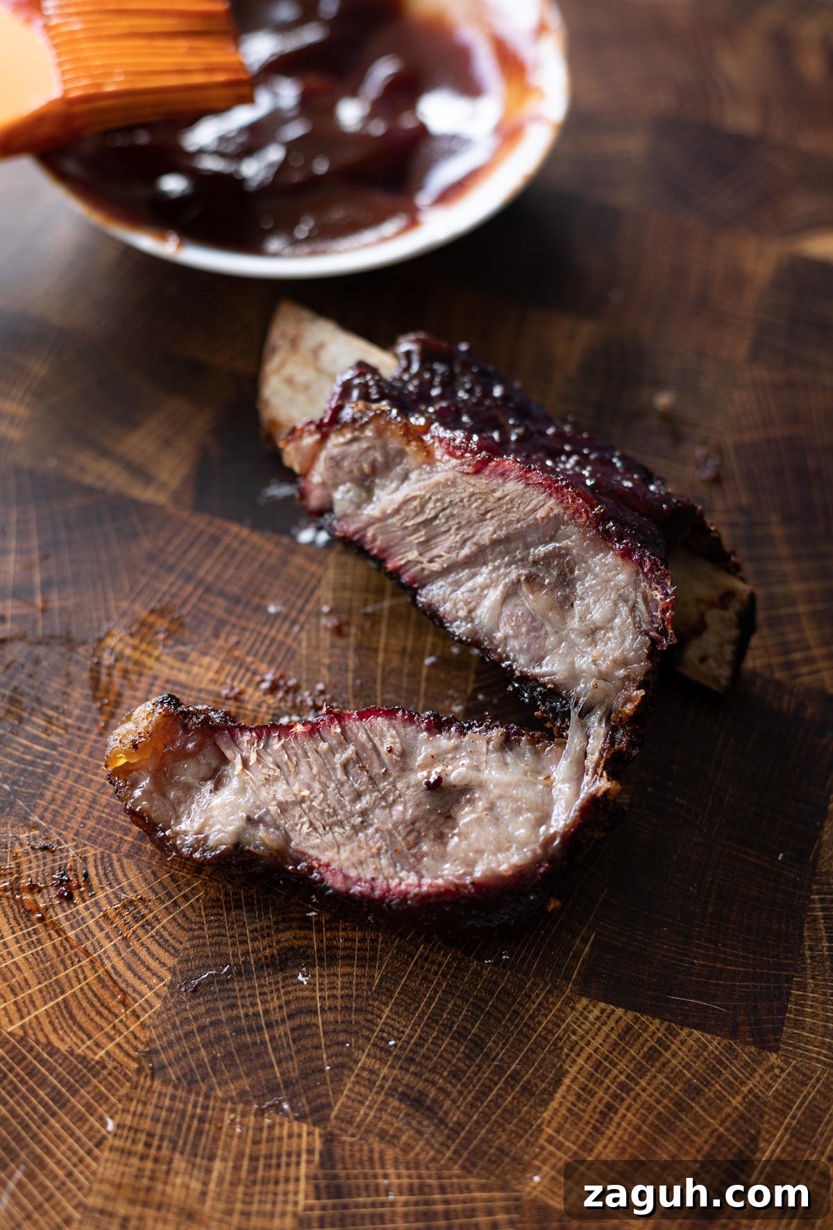 Perfectly Smoked Beef Short Ribs: Tender BBQ Recipe 2 Close up of a sliced smoked short rib.