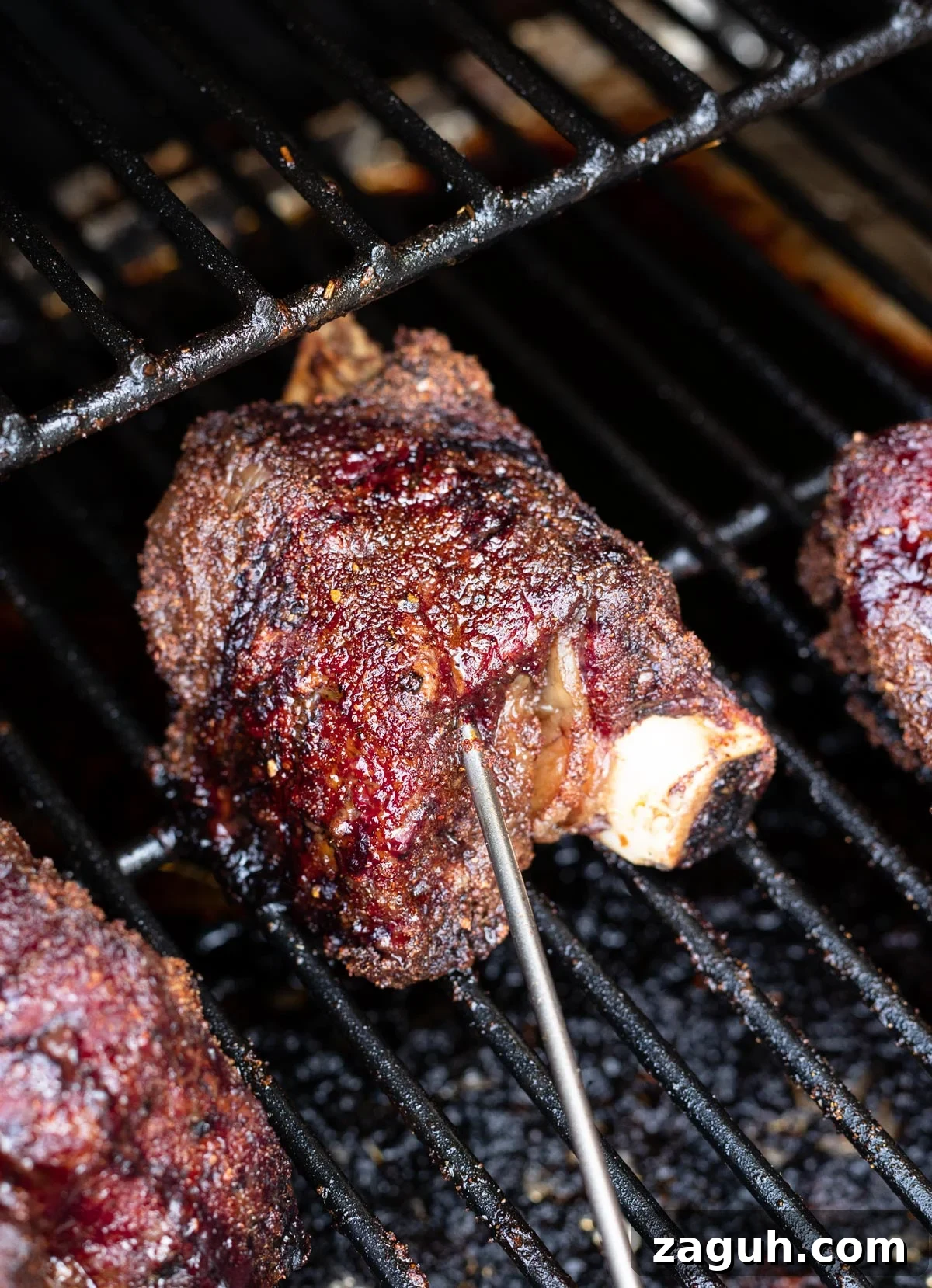 Perfectly Smoked Beef Short Ribs: Tender BBQ Recipe 11 Temperature probe in short rib.