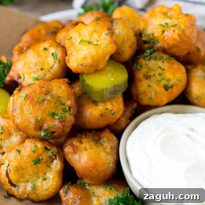 Crispy Southern Fried Pickles Recipe for Ultimate Crunch 7 A plate of fried pickles, served with ranch dip.