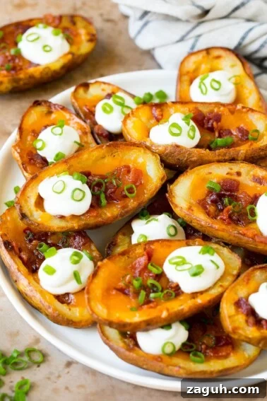 Crispy Southern Fried Pickles Recipe for Ultimate Crunch 4 A serving plate of potato skins topped with bacon and sour cream.