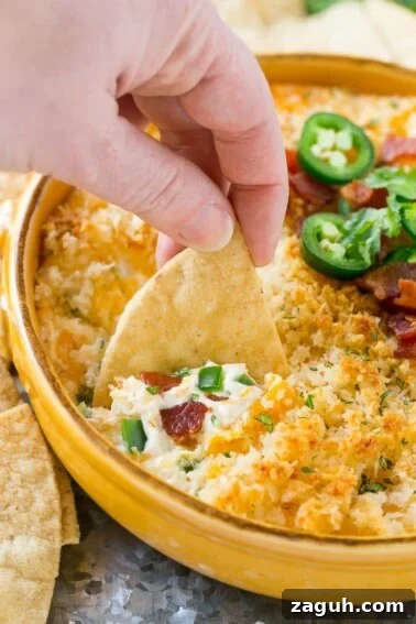 Crispy Southern Fried Pickles Recipe for Ultimate Crunch 5 This jalapeno popper dip is creamy, cheesy, spicy, loaded with bacon and totally addicting! Serve it with tortilla chips for the ultimate party snack.