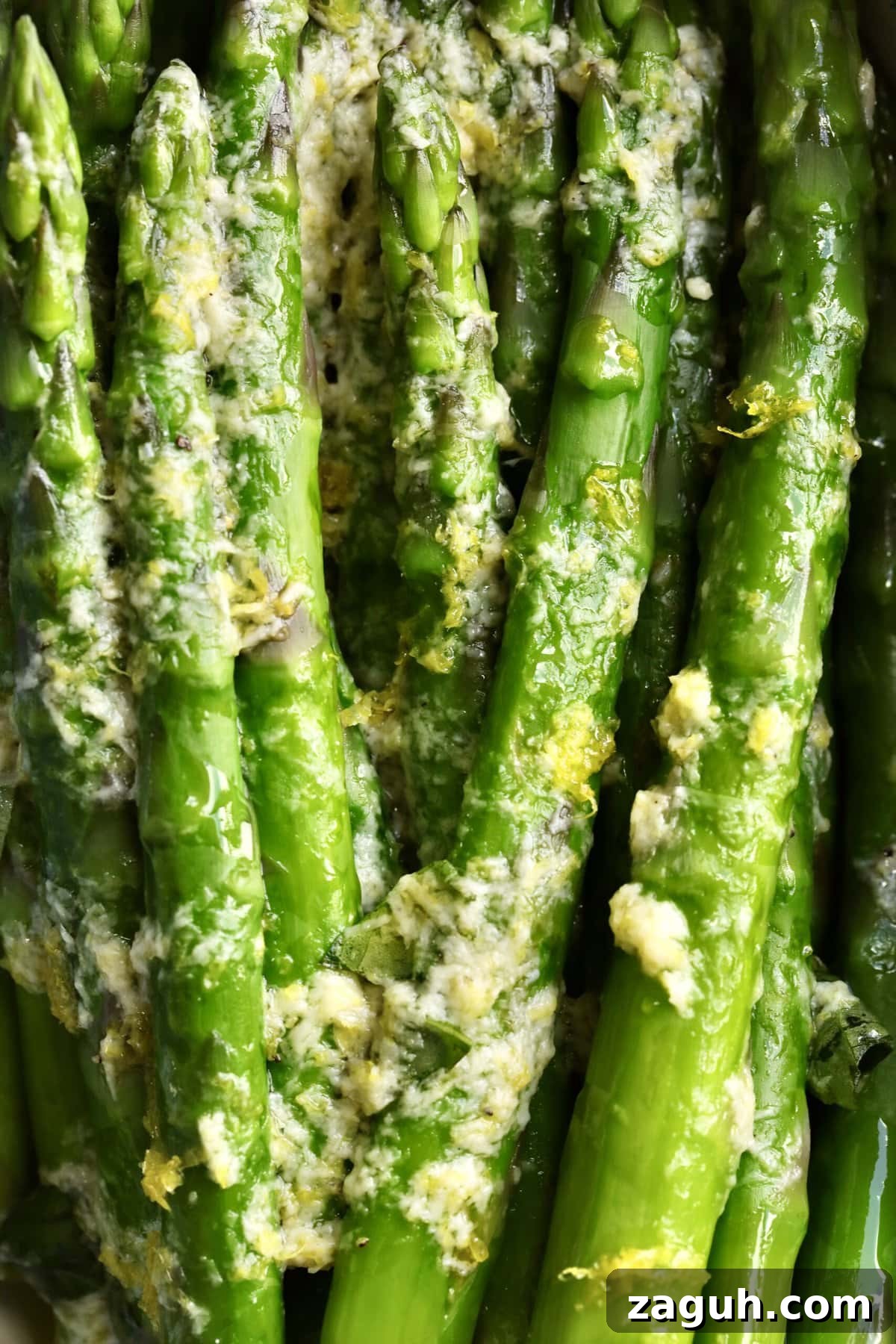 Quick Steamed Asparagus Recipe for Tender, Crisp Spears 11 close up of steam asparagus recipe with simple lemon zest sauce.