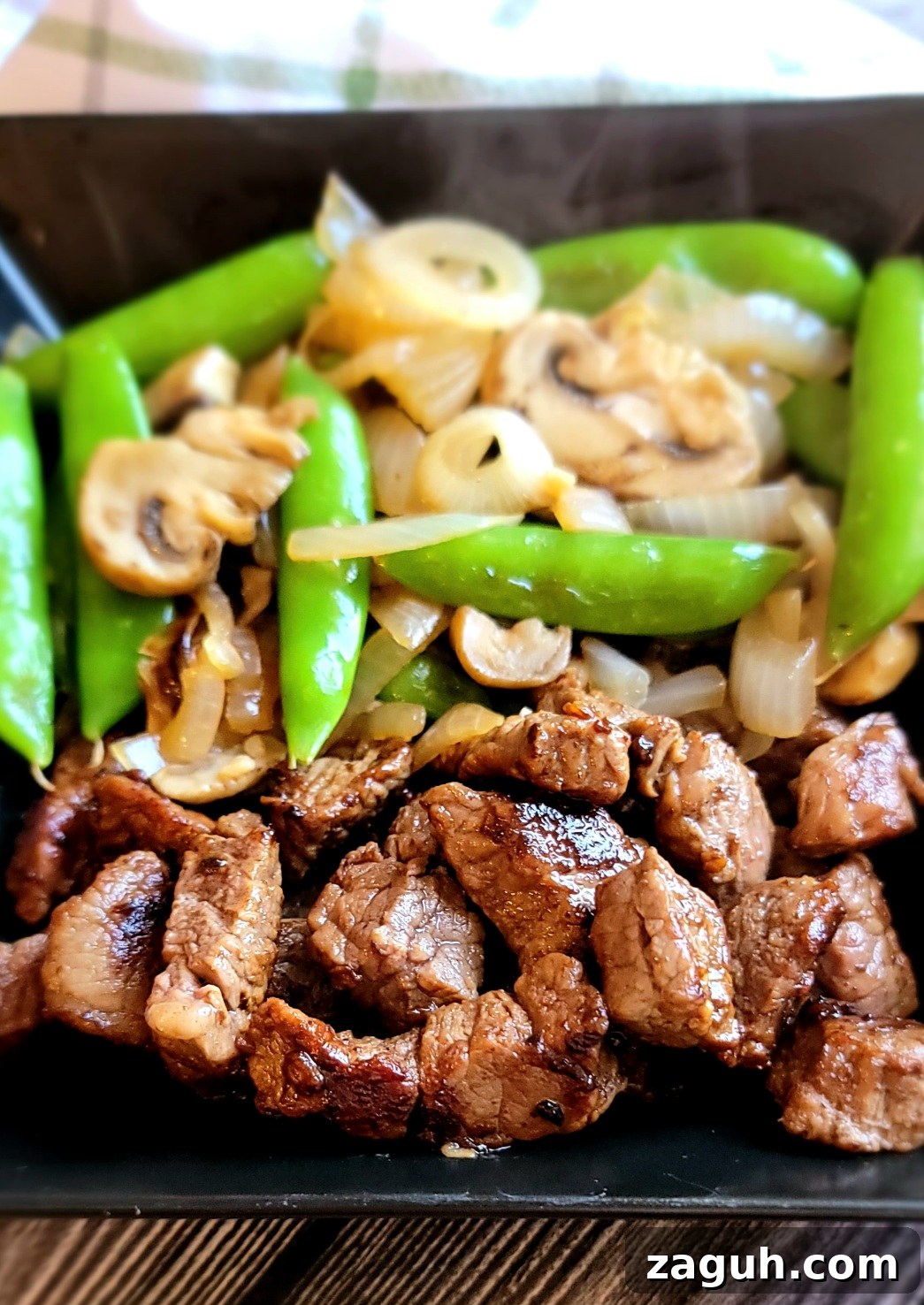 May 2026 Weekly Meal Plan | Week 2 Menu & Recipes 8 Garlic butter steak bites with snap peas and mushrooms