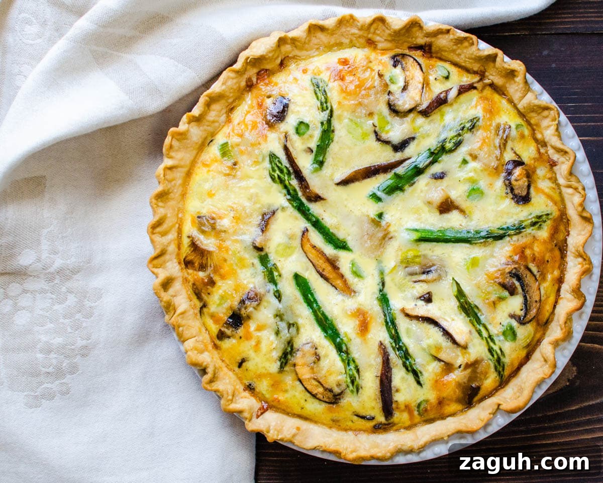 Asparagus, Mushroom & Gruyère Quiche with Leeks for Spring Brunch 5 An overhead shot of the asparagus mushroom quiche.