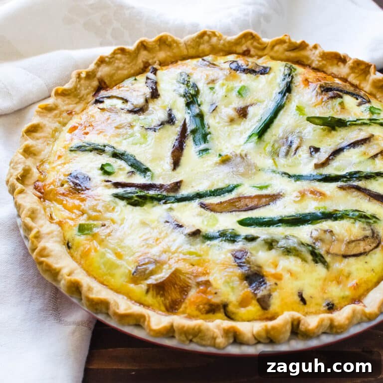 Asparagus, Mushroom & Gruyère Quiche with Leeks for Spring Brunch 9 A baked asparagus mushroom quiche.
