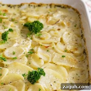 Creamy Baked Scalloped Potatoes with Garlic and Thyme 6 These scalloped potatoes are an easy side dish that can be made ahead of time! Rich and creamy and perfect for any occasion!