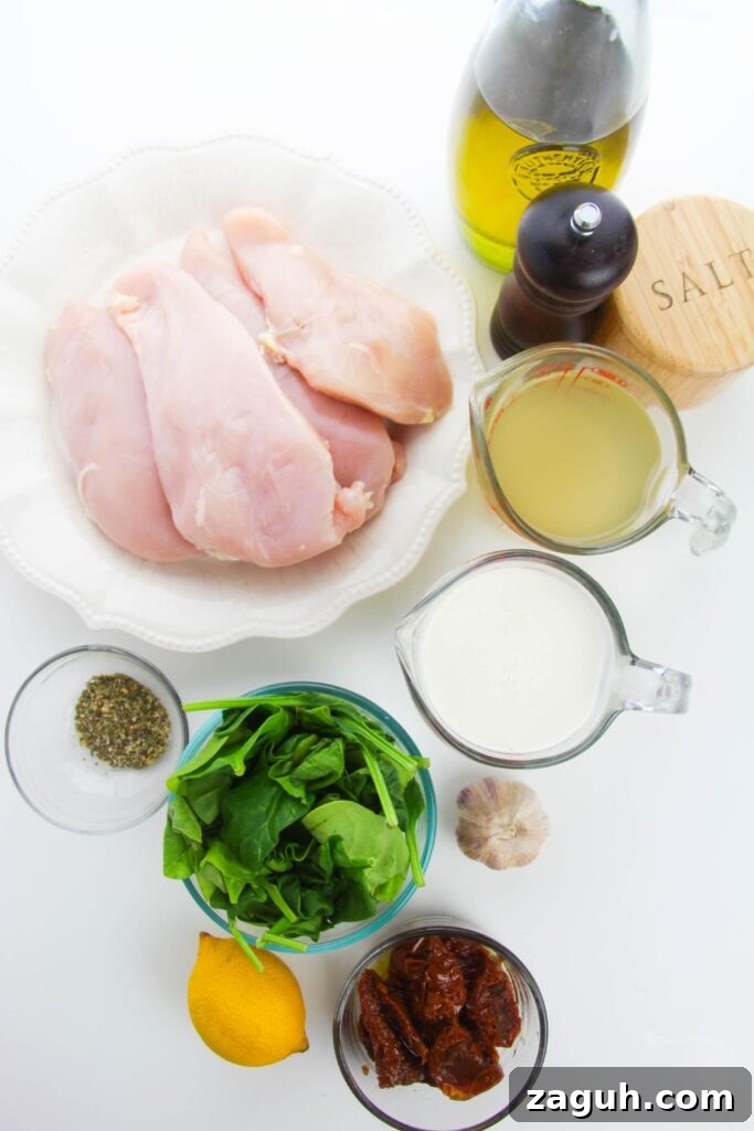 Tuscan-Style Creamy Garlic Chicken with Sun-Dried Tomatoes 4 ingredients on table in single serve containers: boneless chicken, broht, heavy cream, spinach, seasonings, oil, salt, pepper, garlic
