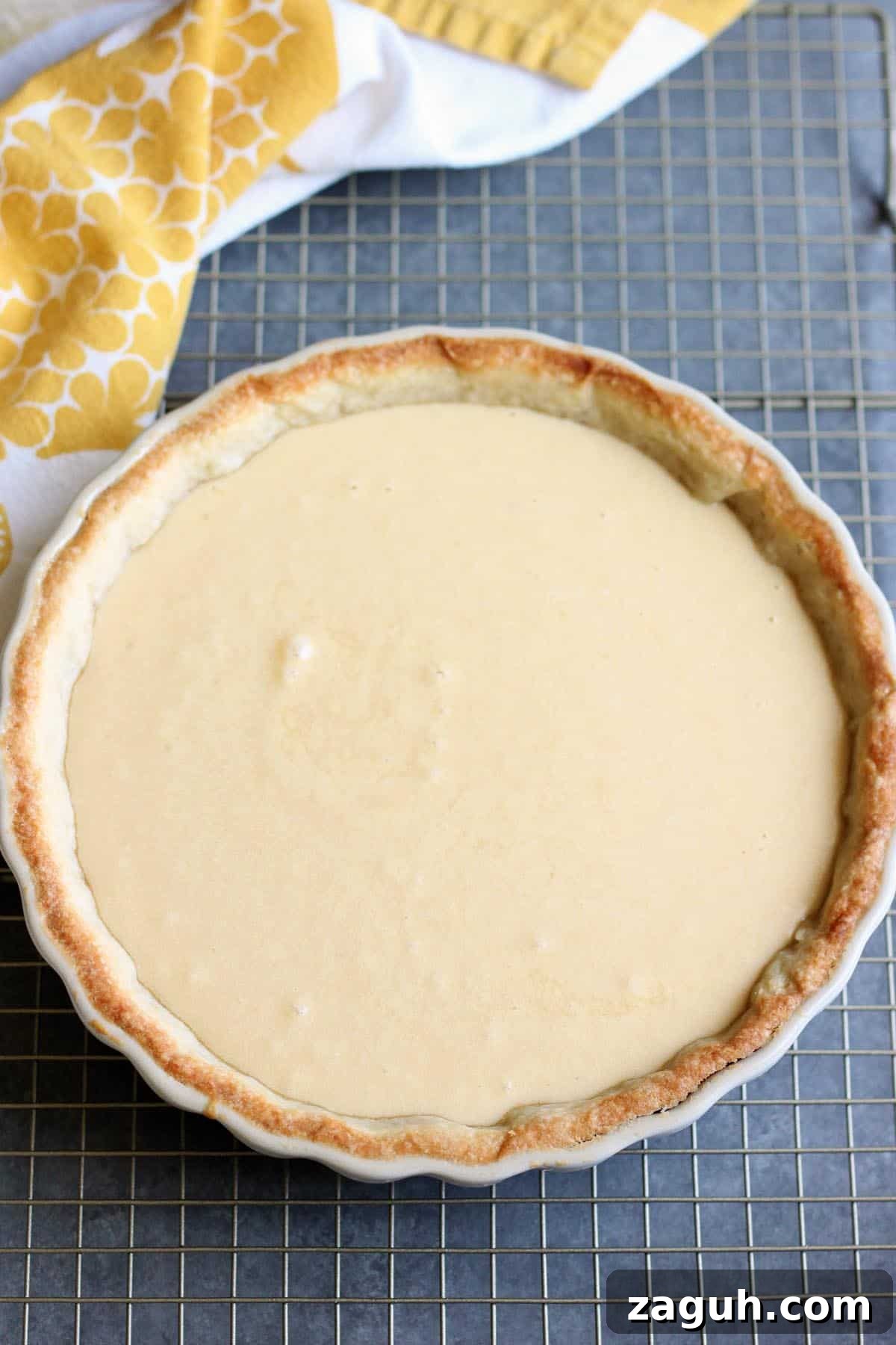 Classic Homemade Custard Pie Recipe for Rich, Creamy Filling 6 Custard pie filling inside a par-baked pie crust.