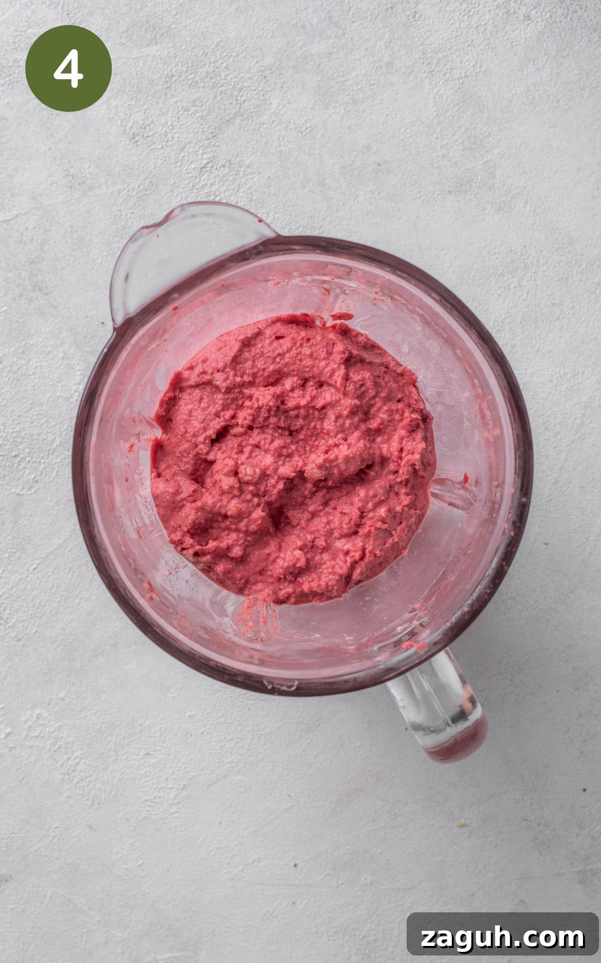 Creamy Beet Hummus Recipe with Garlic and Lemon 7 blended beetroot hummus in a food processor.