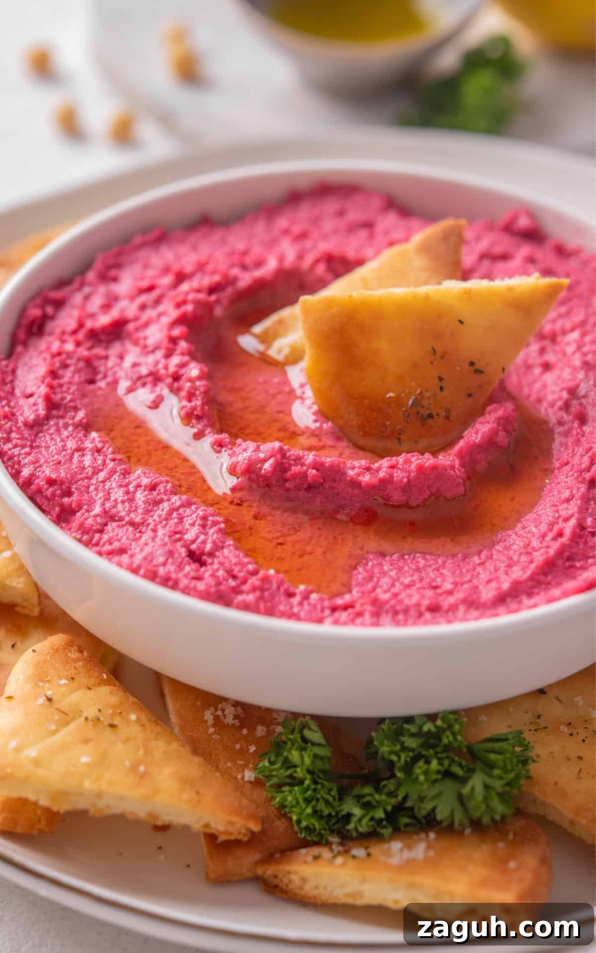 Creamy Beet Hummus Recipe with Garlic and Lemon 8 pink vegan spread made with chickpeas and beetroot.