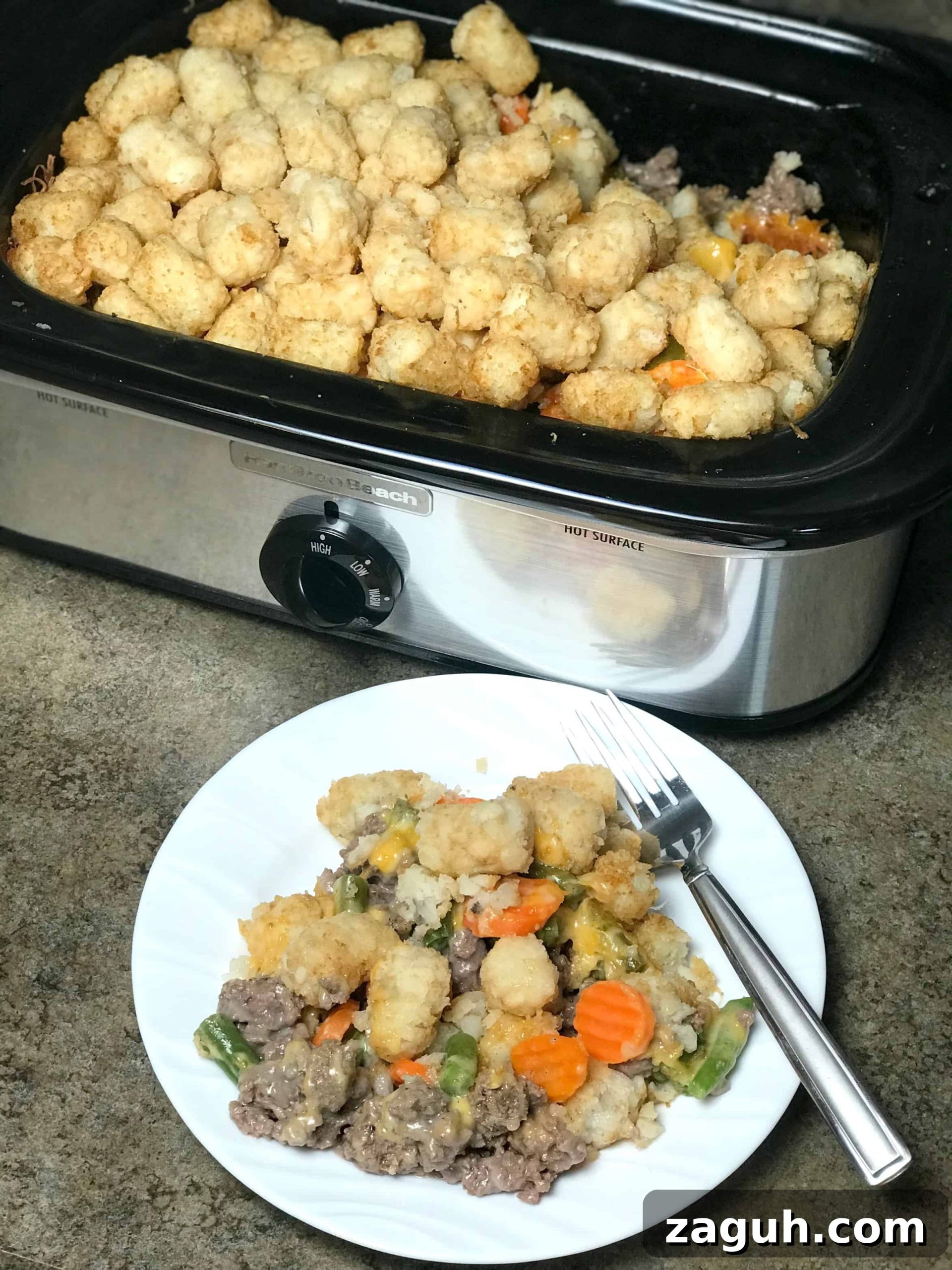 Cheesy Hamburger and Tater Tot Casserole Recipe That Families Love 8 casserole slow cooker full of hamburger and tater tot casserole with mixed vegetables