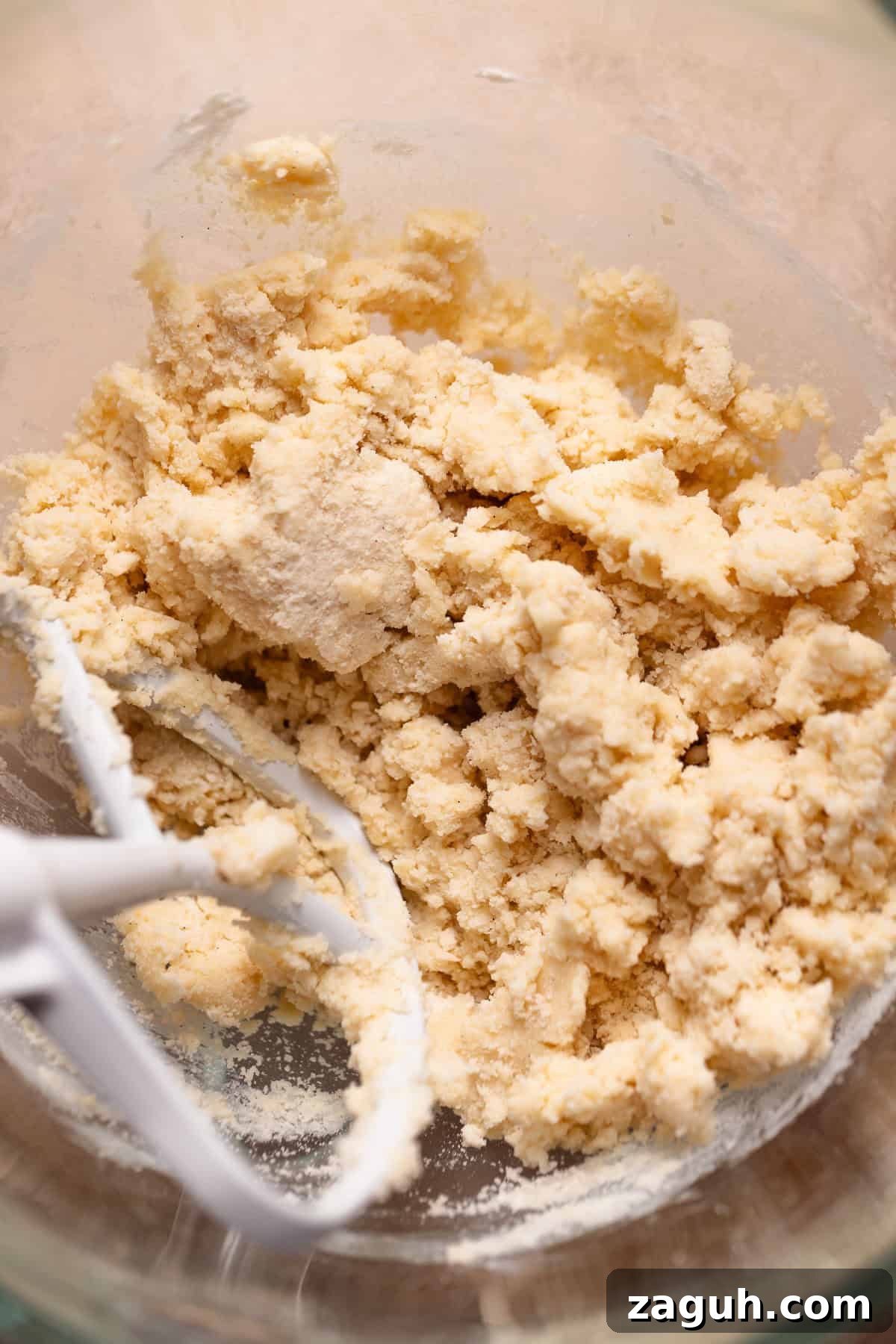 Tangy Lemon Bars with Buttery Shortbread Crust 3 Shortbread dough in a glass mixer bowl.