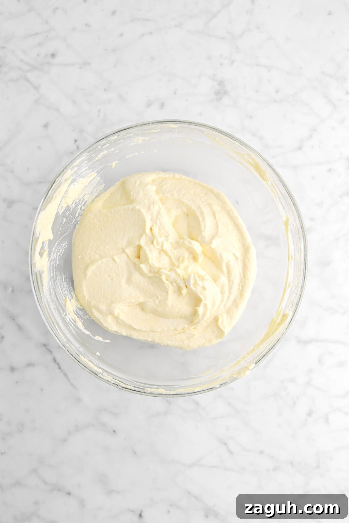 Authentic Italian Tiramisu Recipe: Step-by-Step Classic Guide 8 cream and mascarpone mixture in glass bowl