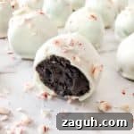 Peppermint Christmas Oreo Truffles — No-Bake Holiday Candy 12 featured image close up of oreo ball