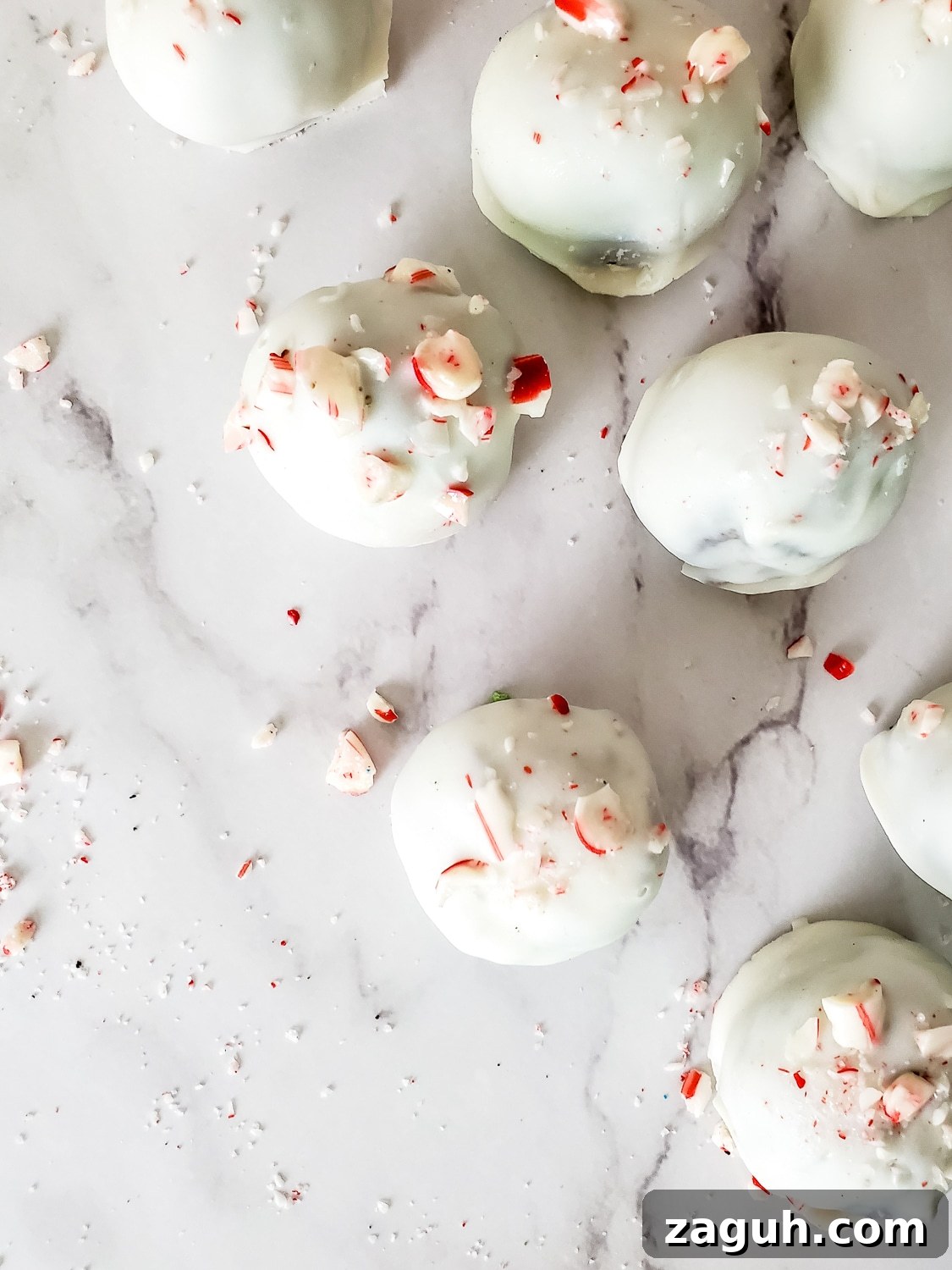 Peppermint Christmas Oreo Truffles — No-Bake Holiday Candy 9 oreo truffles on a white background