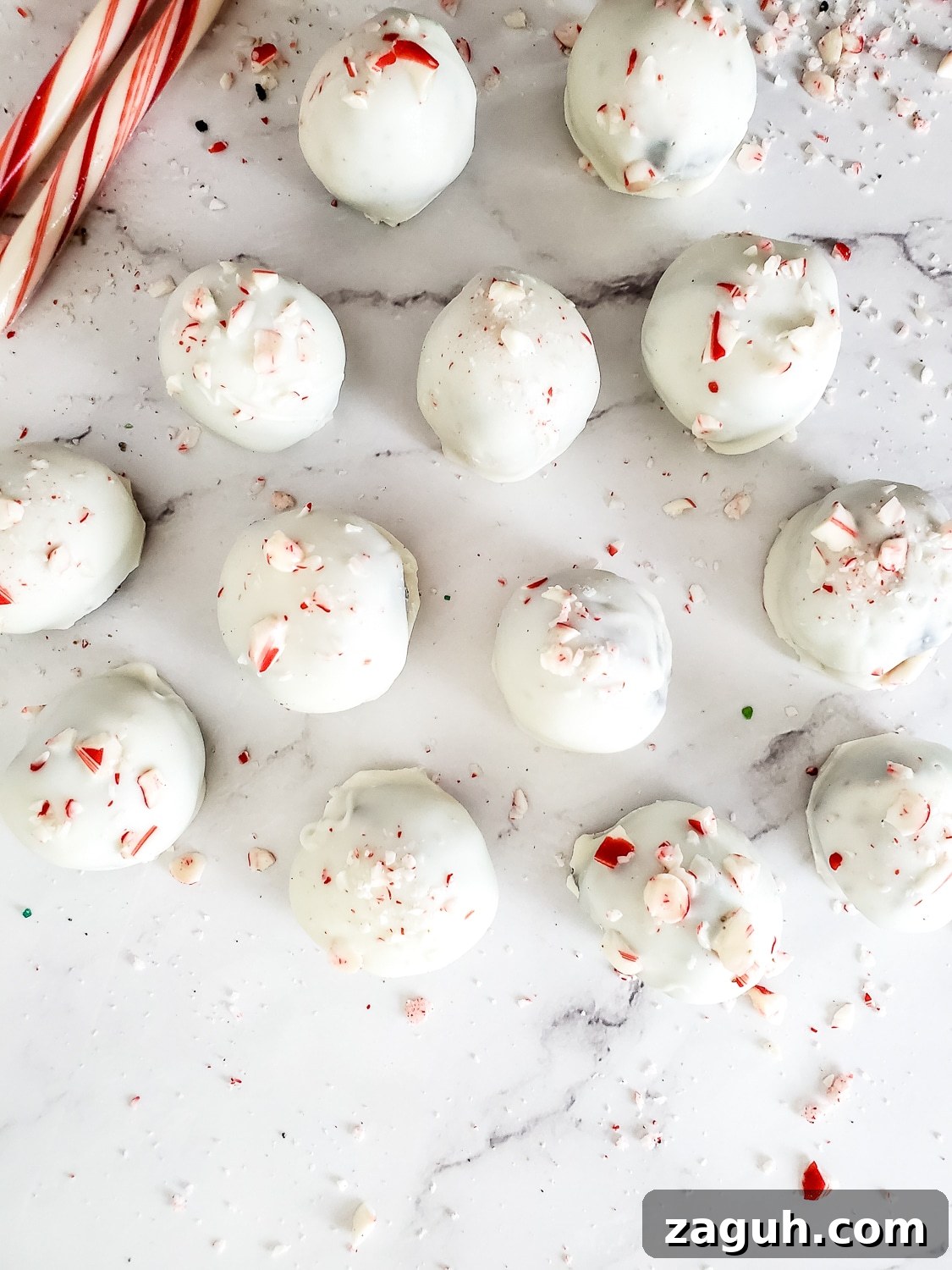 Peppermint Christmas Oreo Truffles — No-Bake Holiday Candy 10 peppermint truffles with Oreos on a white background