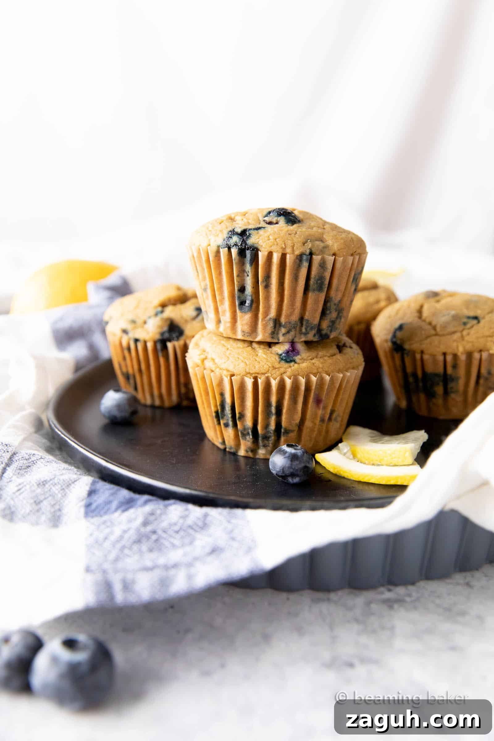 Lemon Blueberry Muffins Recipe with Zesty Citrus Glaze 3 Healthy Lemon Blueberry Muffins: moist and tender with bright lemon and blueberry flavor.