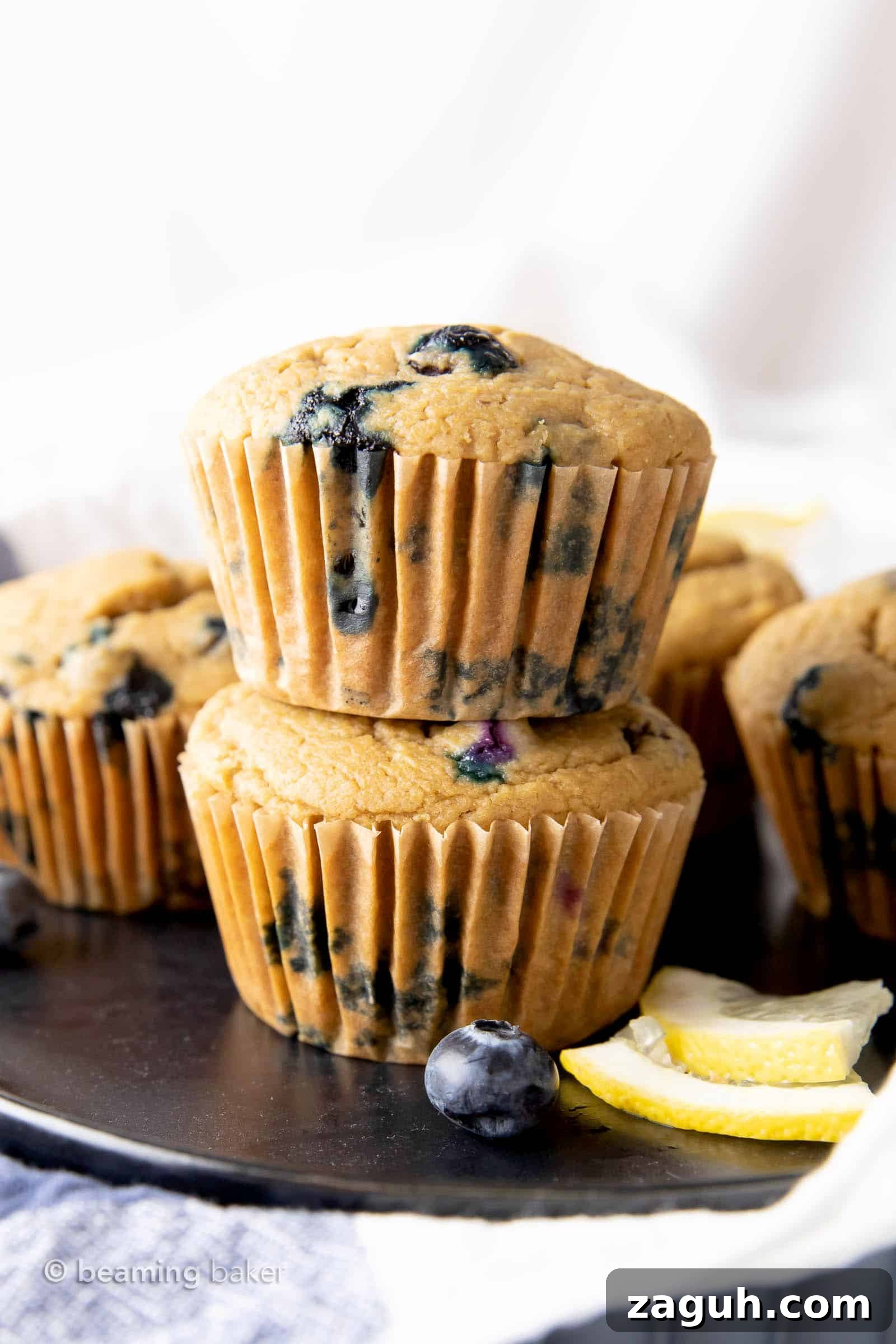 Lemon Blueberry Muffins Recipe with Zesty Citrus Glaze 4 Soft and tender healthy lemon blueberry muffins.