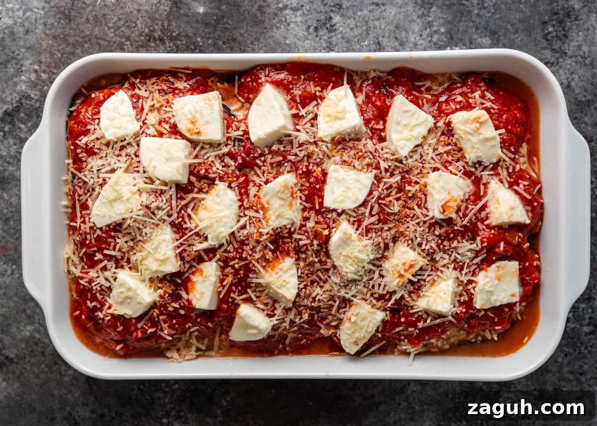 Classic Eggplant Parmigiana Recipe: Authentic Italian Parmigiana di Melanzane 12 overhead: assembled parmigiana ready to go in the oven