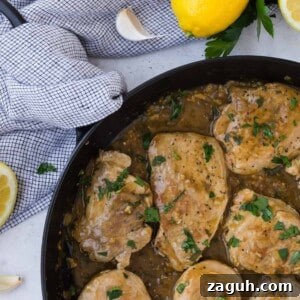 Lemon Garlic Pork Medallions with Creamy Pan Sauce 8 Pork with lemon garlic sauce and parsley.