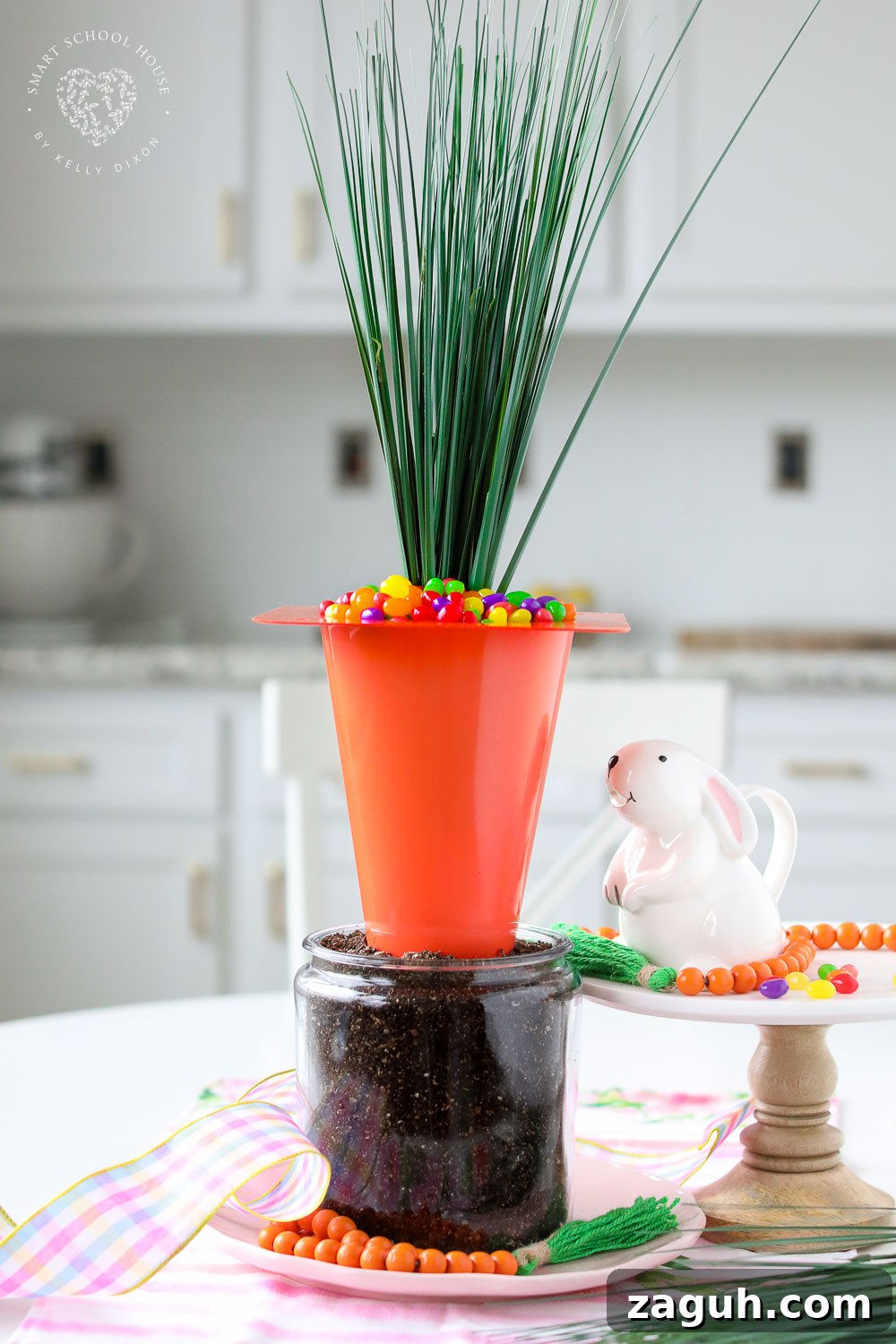 Use an orange playground cone to make a Giant Carrot Centerpiece for the Easter table! This dollar store centerpiece is filled with Jelly Beans!
