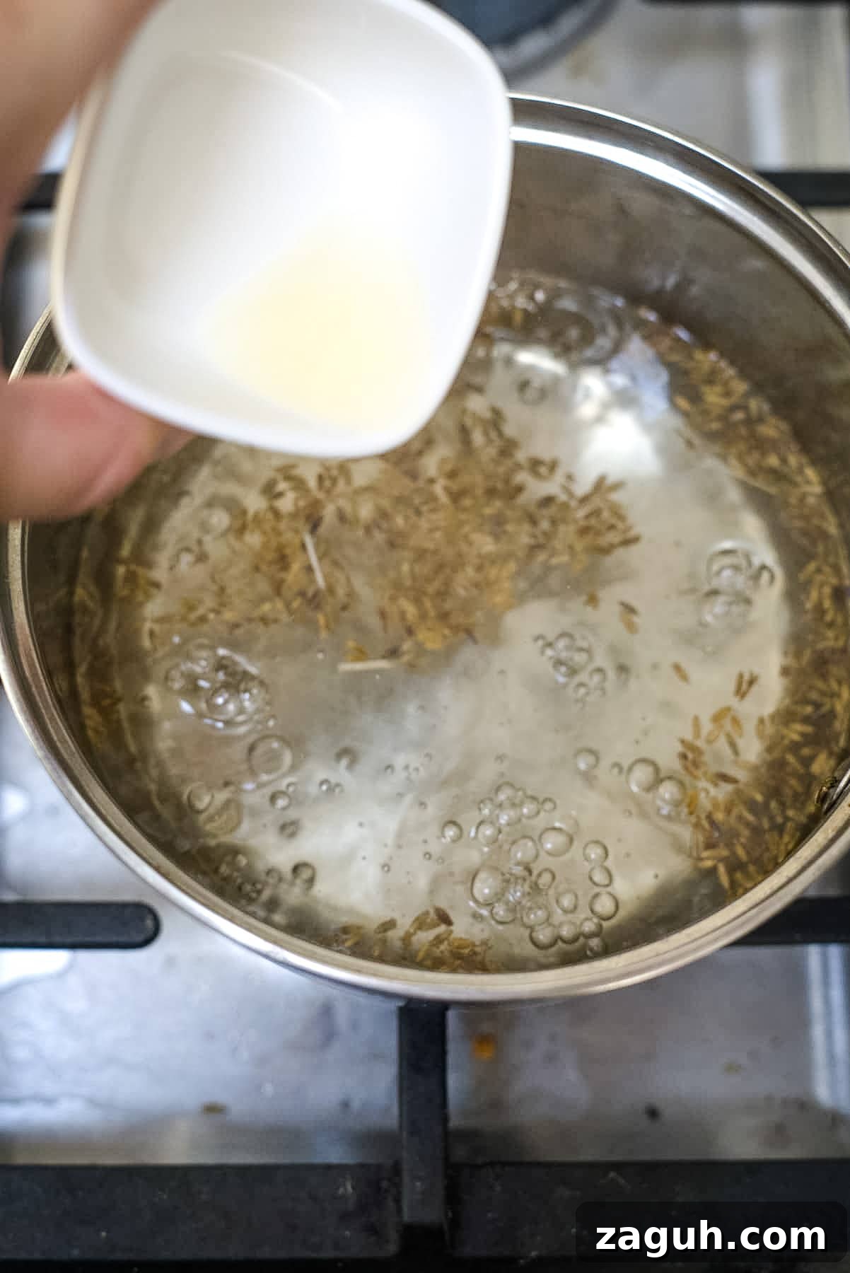 Sugar-Free Lavender Syrup Recipe for Cocktails & Coffee 4 lemon juice added to pot of lavender