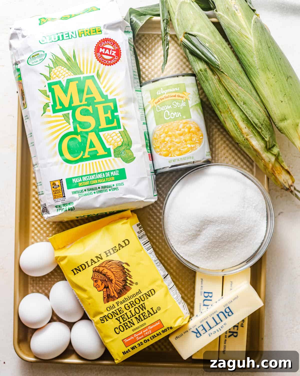 Moist Corn Pound Cake Recipe with Creamy Cornmeal Crumble 3 ingredients to make corn cake - butter, sugar, eggs, fresh corn, masa harina, all purpose flour, cornmeal, creamed corn, baking soda, baking powder, and kosher salt.