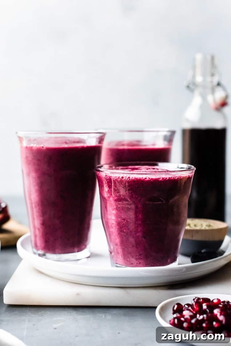 Pomegranate Berry Smoothie Recipe for Fresh Antioxidant Boost 5 Glasses of Pomegranate Berry Smoothies.