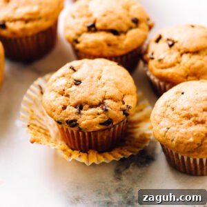 Pumpkin Chocolate Chip Muffins on a counter.