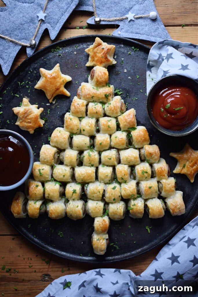 Festive Sausage Roll Christmas Tree Recipe Tutorial 2 Sausages made into a christmas tree shape.