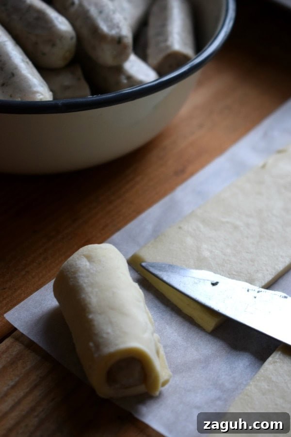 Festive Sausage Roll Christmas Tree Recipe Tutorial 8 Making sausage rolls.