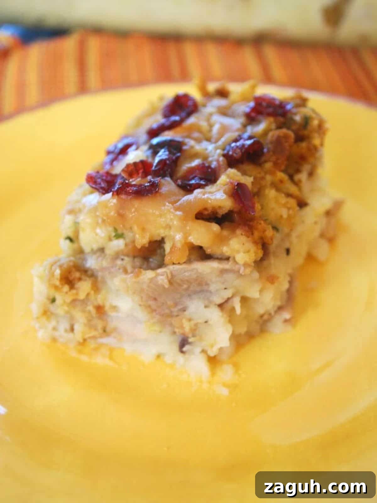 Ultimate Thanksgiving Casserole: One-Pan Holiday Dinner Recipe 2 thanksgiving leftovers casserole on yellow plate.