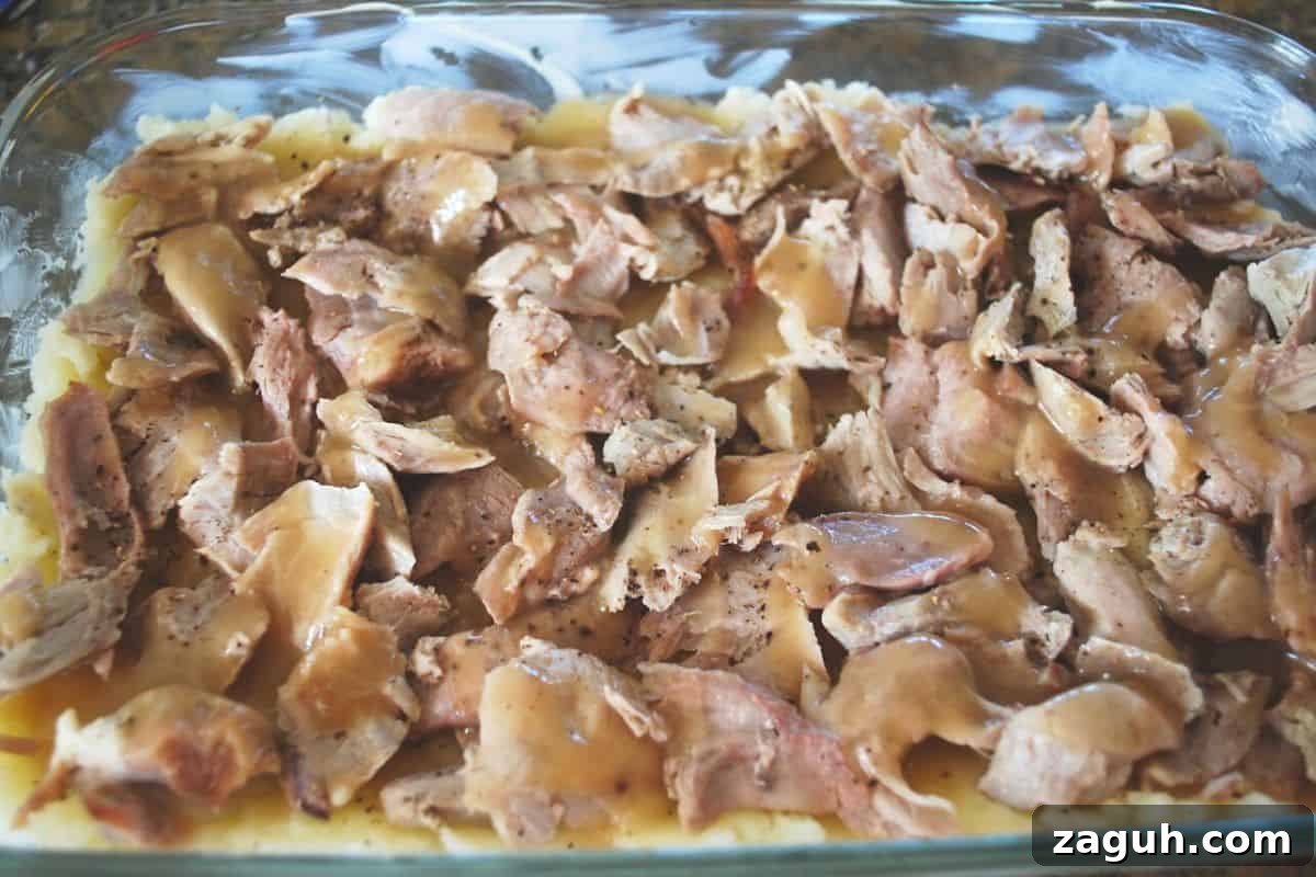 Ultimate Thanksgiving Casserole: One-Pan Holiday Dinner Recipe 7 turkey in a casserole dish.