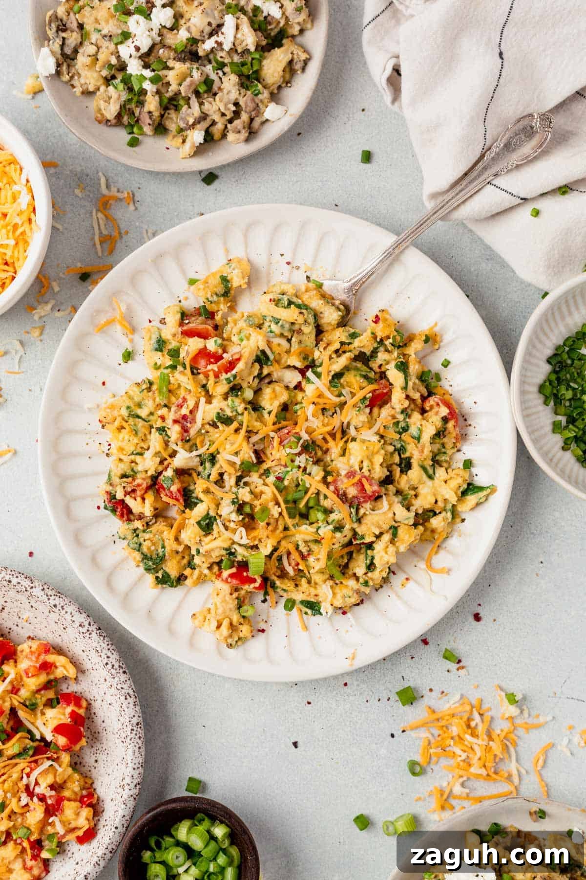Perfectly Fluffy Scrambled Eggs in the Air Fryer 7 a plate of air fryer scrambled eggs